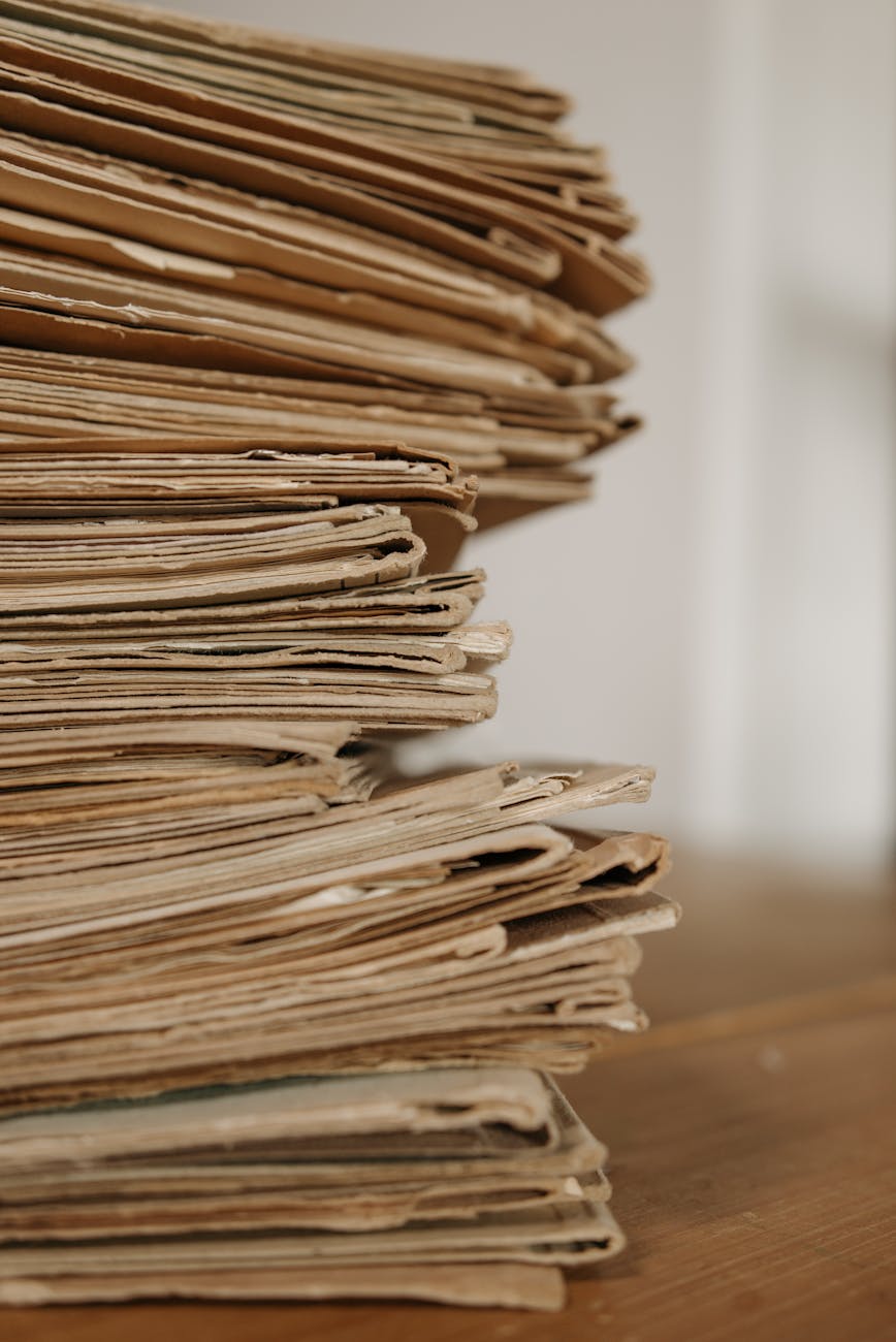 close up shot of document folders on wooden surface